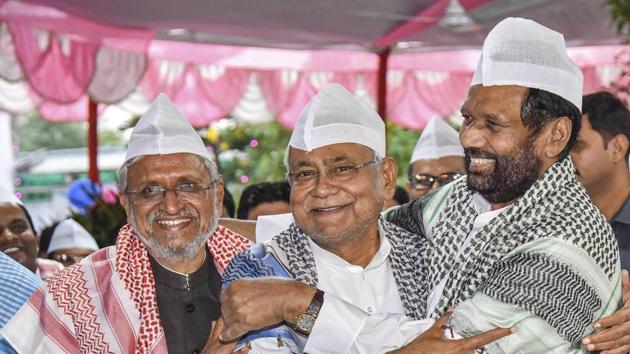 In this Monday, June 3, 2019, file photo Union Minister Ram Vilas Paswan, Bihar Chief Minister Nitish Kumar and Deputy CM Sushil Kumar Modi at an Iftar party during the holy month of Ramadan, in Patna. Paswan passed away on Thursday evening, Oct. 8, 2020. He was 74.(PTI)