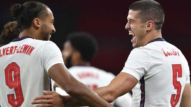 England defender Conor Coady (R) celebrates with Dominic Calvert-Lewin.(AP Photo)
