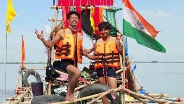 Rishan Doley (left) and Shekhar Bordoloi on their bamboo raft after completion of their trip on Wednesday.(Photo Credit: Rishan Doley) Rishan Doley (left) and Shekhar Bordoloi on their bamboo raft after completion of their trip on Wednesday.(Photo Credit: Rishan Doley)