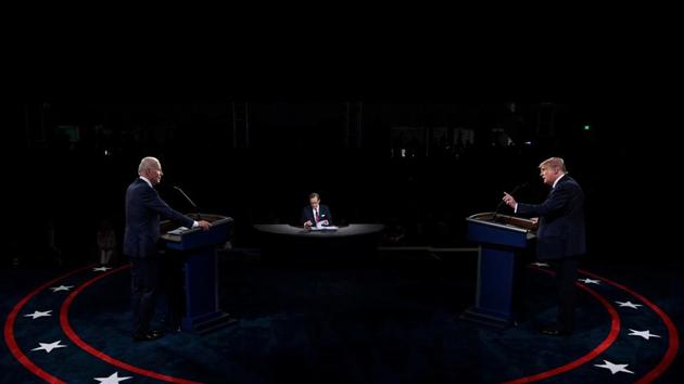 US President Donald Trump and Democratic presidential candidate, former Vice President Joe Biden participate in the first presidential debate at Case Western University and Cleveland Clinic, in Cleveland, Ohio, US. (REUTERS) US President Donald Trump and Democratic presidential candidate, former Vice President Joe Biden participate in the first presidential debate at Case Western University and Cleveland Clinic, in Cleveland, Ohio, US. (REUTERS)