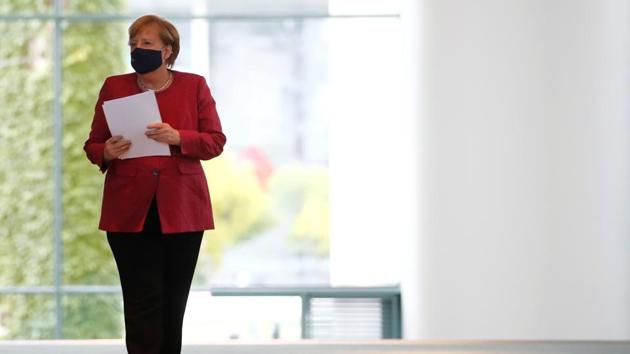 German Chancellor Angela Merkel arrives for a media statement after a video conference with mayors of German cities on the spread of the coronavirus disease (COVID-19), in Berlin, Germany.(REUTERS) German Chancellor Angela Merkel arrives for a media statement after a video conference with mayors of German cities on the spread of the coronavirus disease (COVID-19), in Berlin, Germany.(REUTERS)