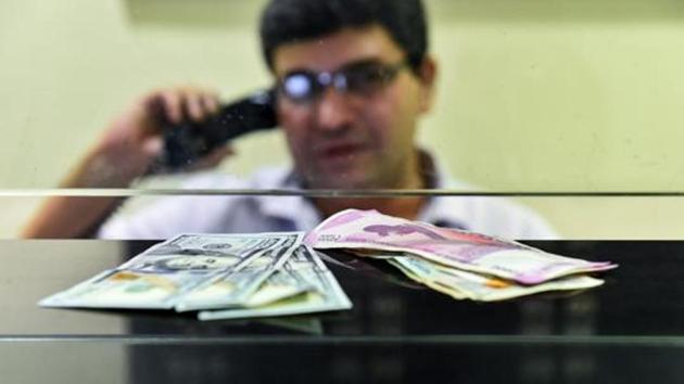 Currency seen at a forex bureau counter in New Delhi.(PTI File Photo)