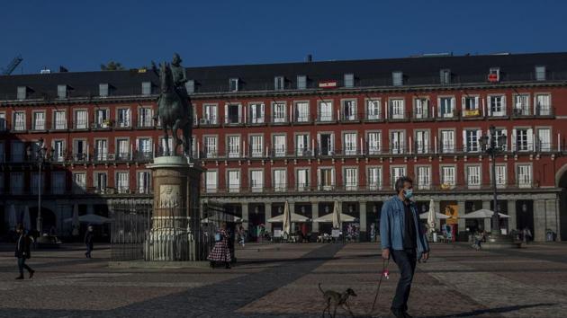 People walk through Plaza Mayor square in downtown Madrid.(AP)