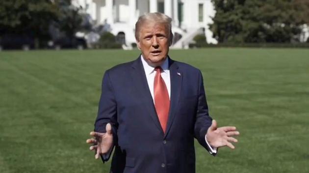 U.S. President Donald Trump speaks outside the White House, where he is being treated for the coronavirus disease (COVID-19), in Washington, U.S. in this still image taken from social media video released on October 8, 2020. (@realDonaldTrump) U.S. President Donald Trump speaks outside the White House, where he is being treated for the coronavirus disease (COVID-19), in Washington, U.S. in this still image taken from social media video released on October 8, 2020. (@realDonaldTrump)