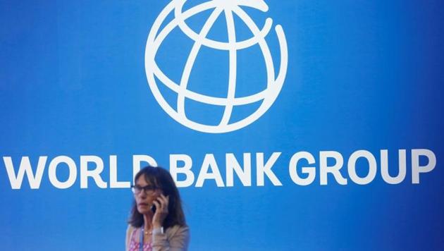 A participant stands near a logo of World Bank at the International Monetary Fund - World Bank Annual Meeting 2018 in Nusa Dua, Bali, Indonesia. (REUTERS) A participant stands near a logo of World Bank at the International Monetary Fund - World Bank Annual Meeting 2018 in Nusa Dua, Bali, Indonesia. (REUTERS)