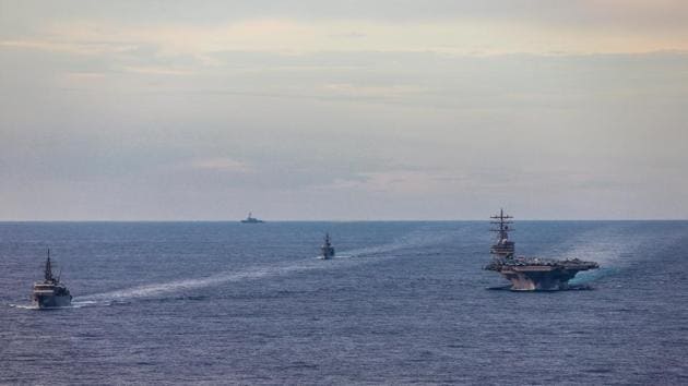 Japan Maritime Self-Defense Force training ships JS Kashima and JS Shimayuki conduct a passing exercise (PASSEX) with Nimitz-class nuclear-powered aircraft carrier USS Ronald Reagan in the South China Sea in this picture from July. (via REUTERS) Japan Maritime Self-Defense Force training ships JS Kashima and JS Shimayuki conduct a passing exercise (PASSEX) with Nimitz-class nuclear-powered aircraft carrier USS Ronald Reagan in the South China Sea in this picture from July. (via REUTERS)