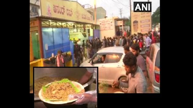 The image shows people waiting in line to get biryani from Anand Dum Biryani.(ANI)