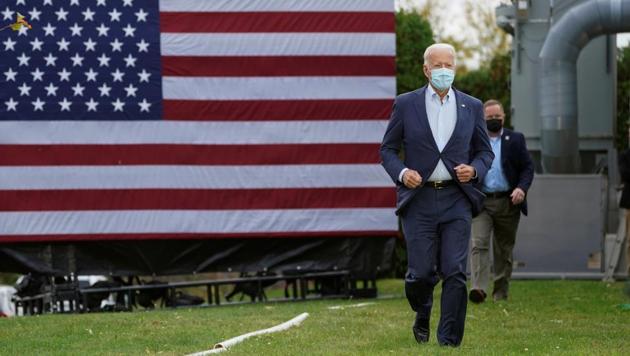 US Democratic presidential candidate Joe Biden runs toward the stage to speak during a campaign event at United Association (UA) Plumbers Local 27 in Erie, PA. (REUTERS) US Democratic presidential candidate Joe Biden runs toward the stage to speak during a campaign event at United Association (UA) Plumbers Local 27 in Erie, PA. (REUTERS)