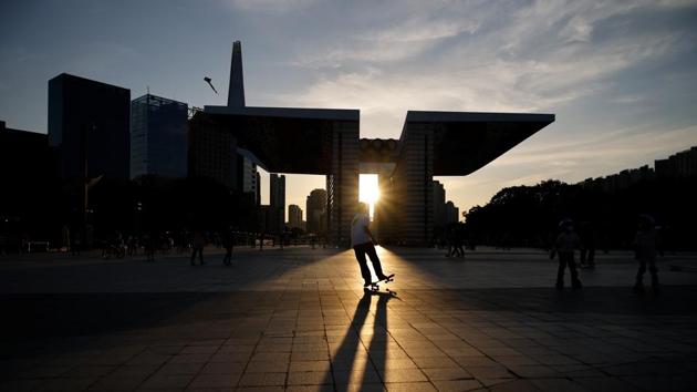 A boy enjoys skateboarding amid the coronavirus disease (Covid-19) pandemic at a park in Seoul, South Korea.(REUTERS) A boy enjoys skateboarding amid the coronavirus disease (Covid-19) pandemic at a park in Seoul, South Korea.(REUTERS)