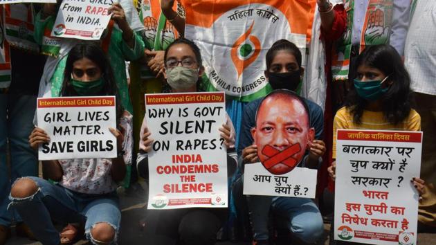 North East District Congress party Workers launch a "Save the Girls of the Country from Rape" campaign to pay homage to the victims of the Hathras gang-rape UP and also protest the silence on the incident by displaying photographs of Modi and Yogi at RRT road markets Mulund ,they demanded that the accused in the UP Hathras gang rape case accused should be hanged. (Praful Gangurde/ HT) North East District Congress party Workers launch a "Save the Girls of the Country from Rape" campaign to pay homage to the victims of the Hathras gang-rape UP and also protest the silence on the incident by displaying photographs of Modi and Yogi at RRT road markets Mulund ,they demanded that the accused in the UP Hathras gang rape case accused should be hanged. (Praful Gangurde/ HT)