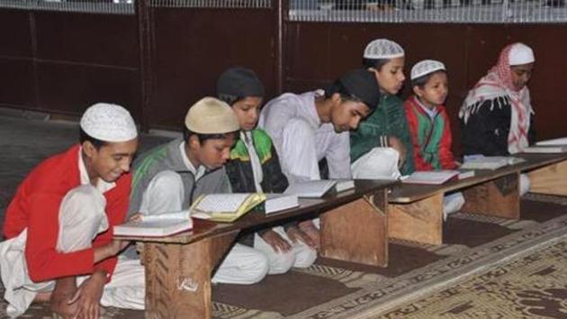 Students studying Madarsa schools