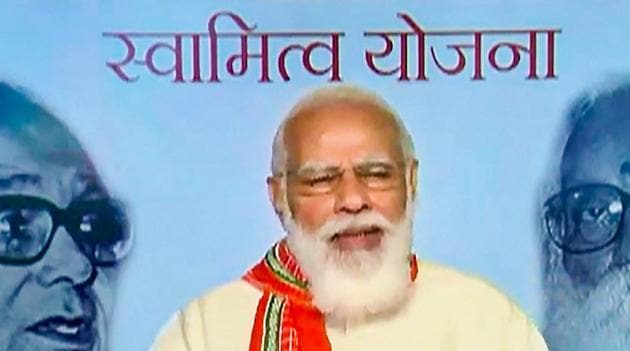 Prime Minister Narendra Modi during the launch of the physical distribution of property cards under the 'SVAMITVA' (ownership) scheme, via video conferencing, in New Delhi. (PTI) Prime Minister Narendra Modi during the launch of the physical distribution of property cards under the 'SVAMITVA' (ownership) scheme, via video conferencing, in New Delhi. (PTI)