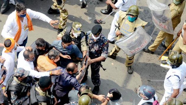 Police personnel detain BJP workers during the party's state-wide 'Nabanna Chalo' agitation in Kolkata.(File photo)