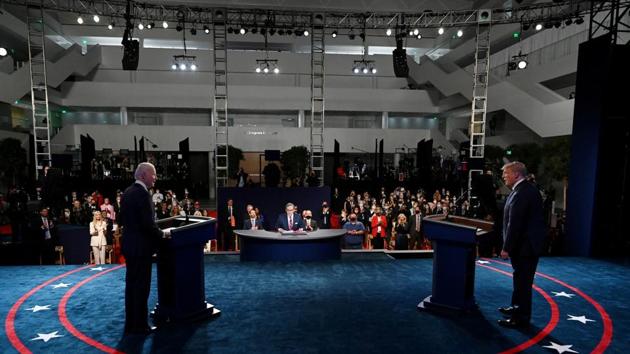 US president Donald Trump (right) and Democratic presidential candidate, former vice president Joe Biden participate in the first presidential debate at Case Western University and Cleveland Clinic, in Cleveland, Ohio, September 29, 2020 (Olivier Douliery/Pool via REUTERS/File Photo)