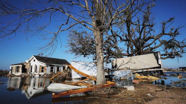 Flood waters from Hurricane Delta surrounds structures destroyed by Hurricane Laura on October 10 in Creole. Hurricane Delta slammed into the US Gulf Coast with a deadly storm surge and violent winds over the weekend, threatening to batter an area of Louisiana still recovering from Hurricane Laura. (Mario Tama / Getty Images / AFP)