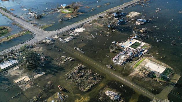 An aerial view of flood waters and destruction caused by Hurricane Delta in Creole, Louisiana on October 10. Delta, the 25th named storm of an unprecedented Atlantic hurricane season, churned ashore on October 9 near the coastal town of Creole with winds topping 155 kph. (Mario Tama / AFP)