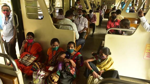 Commuters waiting for services to resume at Prabhadevi station in Mumbai on October 12. Travellers in the morning found themselves stranded after local train services came to a complete standstill for more than two hours owing to the power outage. Those travelling by road were also severely affected after 700 traffic signals across the city stopped functioning. (Anshuman Poyrekar / HT Photo)