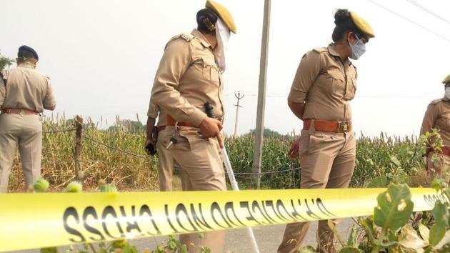 UP police at the crime scene where the Hathras woman was raped and brutalised. (HT Photo) UP police at the crime scene where the Hathras woman was raped and brutalised. (HT Photo)
