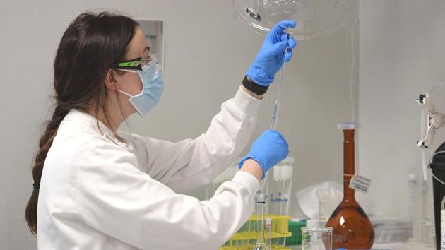An AstraZeneca's chemist works in a lab in Australia. (Reuters file) An AstraZeneca's chemist works in a lab in Australia. (Reuters file)
