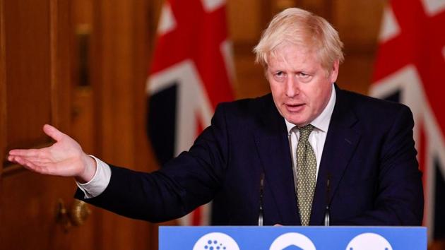 Britain’s Prime Minister Boris Johnson reacts during a virtual press conference at 10 Downing Street in London on October 12. Johnson said the three-level national system was designed to “simplify and standardise” a confusing patchwork of local rules, as the country enters a “crucial phase.” Johnson said hospitals are now filling up with more Covid-19 patients than in March, when he ordered a national lockdown, AP reported. (Toby Melville / AFP)