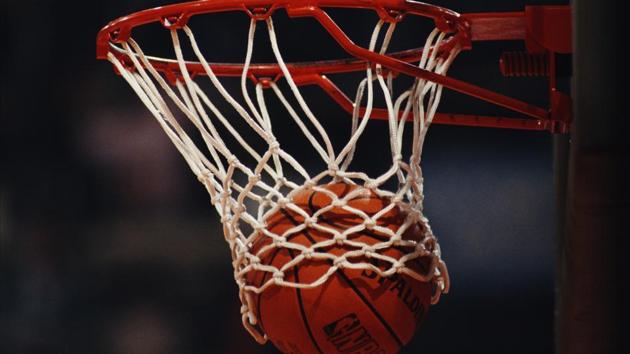 Generic view of a Spalding NBA basketball dropping into the hoop during the FIBA European Basketball Championship.(Getty Images) Generic view of a Spalding NBA basketball dropping into the hoop during the FIBA European Basketball Championship.(Getty Images)