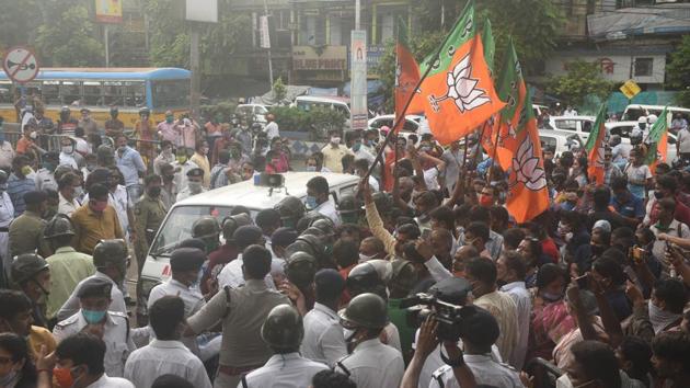 Bharatiya Janata Party supporters gathered outside NRS Hospital where the mortal remains of BJP leader Manish Shukla were kept, in Kolkata, West Bengal. Shukla, 39, an outgoing councillor of the Titagarh municipality in North 24 Parganas district of West Bengal was gunned down on October 4 night. (HT PHOTO.) Bharatiya Janata Party supporters gathered outside NRS Hospital where the mortal remains of BJP leader Manish Shukla were kept, in Kolkata, West Bengal. Shukla, 39, an outgoing councillor of the Titagarh municipality in North 24 Parganas district of West Bengal was gunned down on October 4 night. (HT PHOTO.)