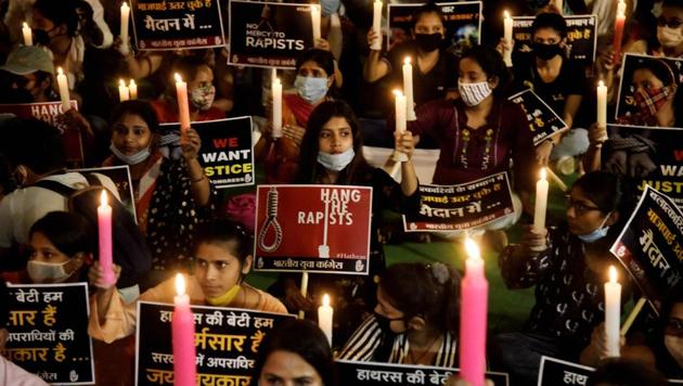 Members of Indian Youth Congress sit in during a candle protest over the Hathras gang-rape and demanding justice for the victim, at Jantar Mantar, in New Delhi (ANI Photo) Members of Indian Youth Congress sit in during a candle protest over the Hathras gang-rape and demanding justice for the victim, at Jantar Mantar, in New Delhi (ANI Photo)