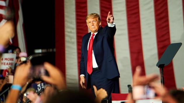 US President Donald Trump gestures during a campaign rally in Sanford, Florida, US on Monday.(Bloomberg Photo) US President Donald Trump gestures during a campaign rally in Sanford, Florida, US on Monday.(Bloomberg Photo)