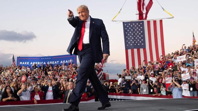US President Donald Trump holds a Make America Great Again rally as he campaigns at Orlando Sanford International Airport in Sanford, Florida, on October 12. (AFP) US President Donald Trump holds a Make America Great Again rally as he campaigns at Orlando Sanford International Airport in Sanford, Florida, on October 12. (AFP)