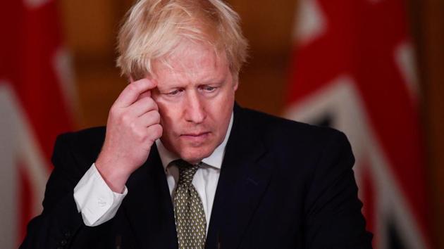 Britain's Prime Minister Boris Johnson attends a virtual news conference on the ongoing situation with the coronavirus disease at Downing Street, London.(REUTERS)