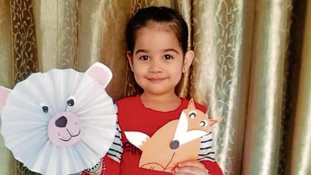 A student of Indira Holiday Home Preparatory School, Chandigarh, showing her artwork. A student of Indira Holiday Home Preparatory School, Chandigarh, showing her artwork.