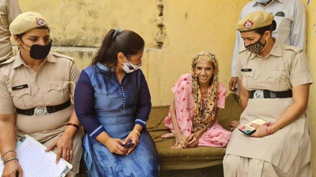 The woman after she was rescued by a team of district women and child welfare department officials on Wednesday. (HT Photo) The woman after she was rescued by a team of district women and child welfare department officials on Wednesday. (HT Photo)