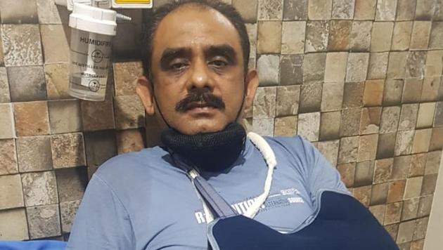 Mahesh Khulbe, who is a member of the BJP’s state working committee, had to be hospitalised for treatment after his arm was fractured in the incident.(HT PHOTO.) Mahesh Khulbe, who is a member of the BJP’s state working committee, had to be hospitalised for treatment after his arm was fractured in the incident.(HT PHOTO.)