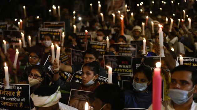 Youth Congress members and Congress supporters hold candles during a protest against the Hathras gang rape, at Jantar Mantar in New Delhi. (Biplov Bhuyan/HT PHOTO) Youth Congress members and Congress supporters hold candles during a protest against the Hathras gang rape, at Jantar Mantar in New Delhi. (Biplov Bhuyan/HT PHOTO)