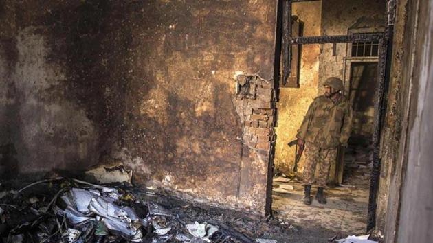 An army soldier stands in the Army Public School which was attacked by Taliban gunmen, in Peshawar in 2014.(File photo)