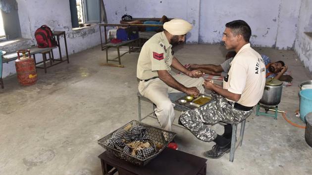 Over 70 cops have been housed in 15 classrooms and a hall of Government Senior Secondary School, Multipurpose, Ludhiana.(Gurpreet Singh/HT)