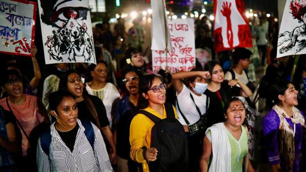 Female activists and students take part in a torch procession demanding women's safety and justice for rape victims, amid the coronavirus disease (COVID-19) outbreak in Dhaka, Bangladesh.(REUTERS)