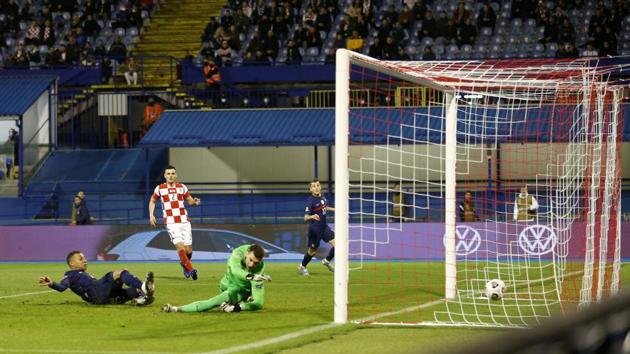 France’s Kylian Mbappe, left, scores his side’s second goal during the UEFA Nations League soccer match against Croatia(AP Photo)