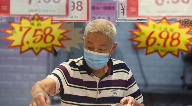 China’s consumer inflation slowed to its weakest in 19 months. In picture, a customer shops at a supermarket in Hangzhou in eastern China's Zhejiang Province(Photo by STR/AFP) China’s consumer inflation slowed to its weakest in 19 months. In picture, a customer shops at a supermarket in Hangzhou in eastern China's Zhejiang Province(Photo by STR/AFP)