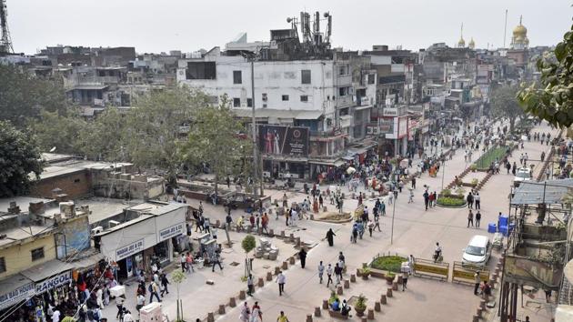 People out on the street at Chandni Chowk in New Delhi on October 14. “India has come a long way from registering a doubling rate of 25.5 days in mid August to now registering a doubling rate of nearly 73 days,” the health ministry said on its official Twitter handle. (Ajay Aggarwal / HT Photo)