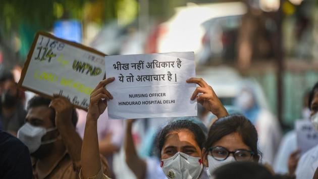 Resident doctors and nurses of Hindu Rao Hospital continue to protest against Delhi Government and MCD alleging salary non-payment over the last few months, in New Delhi. (Amal KS/HT file photo) Resident doctors and nurses of Hindu Rao Hospital continue to protest against Delhi Government and MCD alleging salary non-payment over the last few months, in New Delhi. (Amal KS/HT file photo)