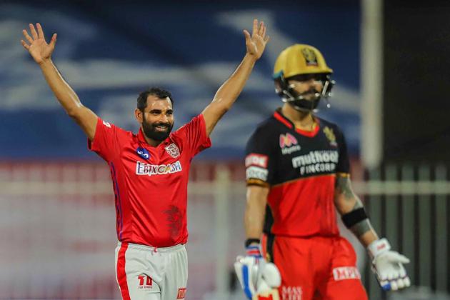 Sharjah: Kings XI Punjab bowler Mohammed Shami celebrates the wicket of Royal Challengers Bangalore batsman during the Indian Premier League (IPL) cricket match, at Sharjah Cricket Stadium, in Sharjah, Thursday, Oct. 15, 2020. (PTI Photo/Sportzpics)(PTI15-10-2020_000236B) (PTI)