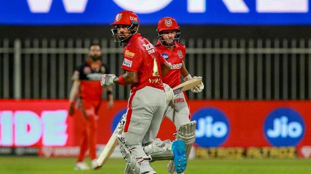 Sharjah: Kings XI Punjab batsmen KL Rahul and Mayank Agarwal run between the wickets during the Indian Premier League (IPL) cricket match against Royal Challengers Bangalore, at Sharjah Cricket Stadium, in Sharjah, Thursday, Oct. 15, 2020. (PTI Photo/Sportzpics)(PTI15-10-2020_000248B) (PTI)
