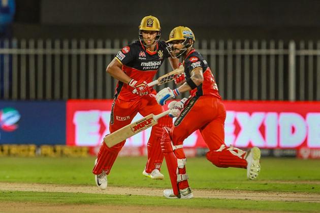Sharjah: Royal Challengers Bangalore batsmen Shivam Dube and Virat Kohli run between the wickets during the Indian Premier League (IPL) cricket match, at Sharjah Cricket Stadium, in Sharjah, Thursday, Oct. 15, 2020. (PTI Photo/Sportzpics)(PTI15-10-2020_000225A) (PTI)
