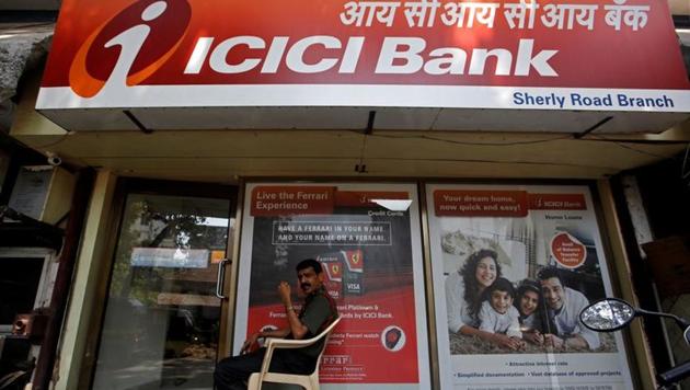 A security guard sits outside an ICICI bank branch in Mumbai (REUTERS/Francis Mascarenhas/Files) A security guard sits outside an ICICI bank branch in Mumbai (REUTERS/Francis Mascarenhas/Files)