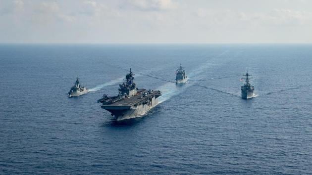 The Chinese military followed and monitored the USS Barry when the destroyer made what US Navy called a “routine Taiwan Strait transit” on Wednesday. In this picture, Royal Australian Navy guided-missile frigate HMAS Parramatta (FFH 154) (L) sails with US Navy Amphibious assault ship USS America (LHA 6), Ticonderoga-class guided-missile cruiser USS Bunker Hill (CG 52) and Arleigh-Burke class guided missile destroyer USS Barry (DDG 52) in the South China Sea. (via REUTERS) The Chinese military followed and monitored the USS Barry when the destroyer made what US Navy called a “routine Taiwan Strait transit” on Wednesday. In this picture, Royal Australian Navy guided-missile frigate HMAS Parramatta (FFH 154) (L) sails with US Navy Amphibious assault ship USS America (LHA 6), Ticonderoga-class guided-missile cruiser USS Bunker Hill (CG 52) and Arleigh-Burke class guided missile destroyer USS Barry (DDG 52) in the South China Sea. (via REUTERS)