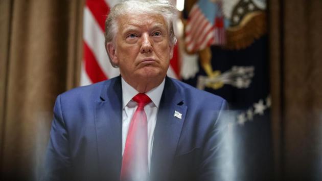 President Donald Trump listens during a meeting with US tech workers, before signing an Executive Order on hiring American workers, in the Cabinet Room of the White House, in Washington. (AP) President Donald Trump listens during a meeting with US tech workers, before signing an Executive Order on hiring American workers, in the Cabinet Room of the White House, in Washington. (AP)