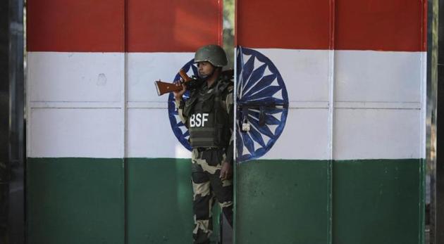 An Indian Border Security Force soldier walks through a gate painted with the Indian flag at the India-Pakistan border at Suchet Garh in Ranbir Singh Pura, about 27 kilometers south of Jammu, India, Thursday, January 23, 2020.(AP file photo for representation)