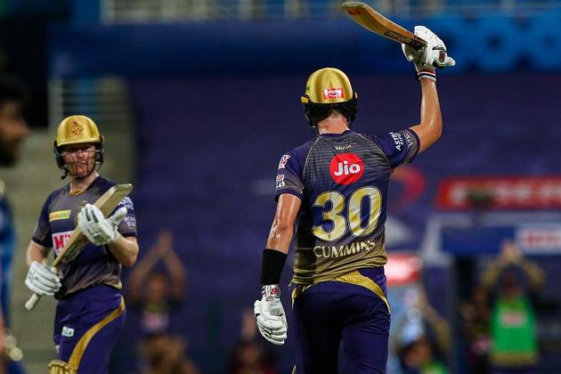 Abu Dhabi: Kolkata Knight Riders batsman Pat Cummins raises his bat after scoring a fifty during Indian Premier League (IPL) cricket match against Mumbai Indians, at Sheikh Zayed Stadium in Abu Dhabi, Friday, Oct. 16, 2020. (PTI Photo/Sportzpics for BCCI)(PTI16-10-2020_000192A) (PTI)