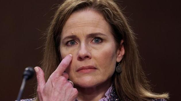 US Supreme Court nominee Judge Amy Coney Barrett pauses while testifying on the third day of her US Senate Judiciary Committee confirmation hearing on Capitol Hill in Washington, US on October 14, 2020.(Reuters File Photo)